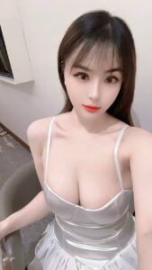 KL China Escort Bao Bao sitting gracefully on the bed